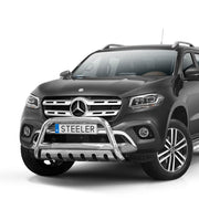 Black Mercedes-Benz pickup truck with Steeler bumper on a white background